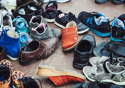 Many shoes in a hallway