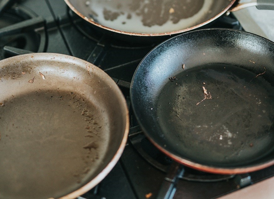 Dirty pans on hob