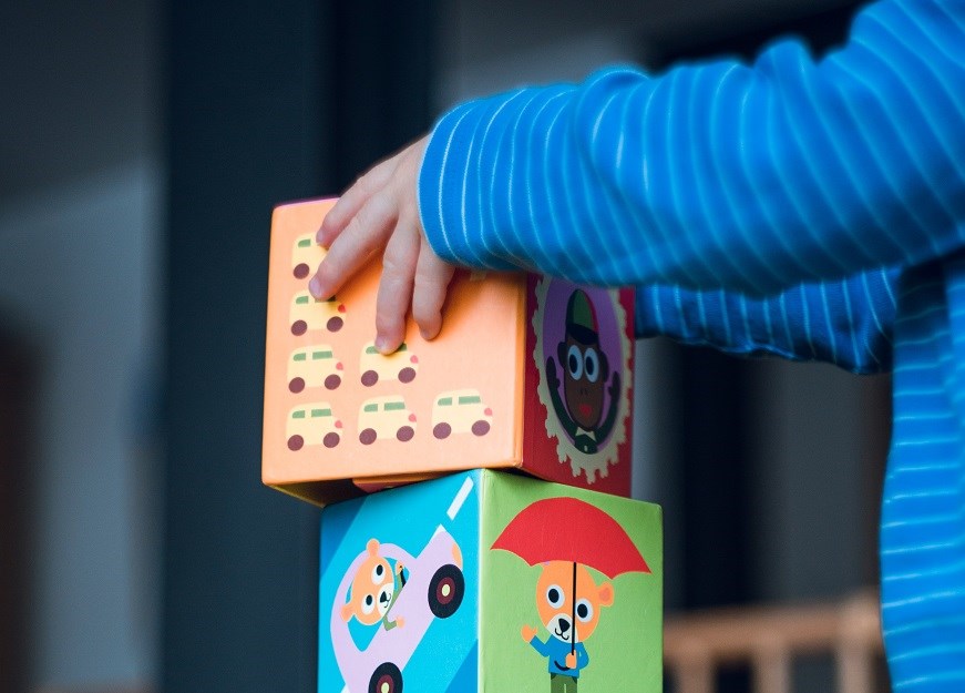 An infant stacking play blocks