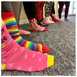 Photo of colourful socks to celebrate World Down Syndrome day