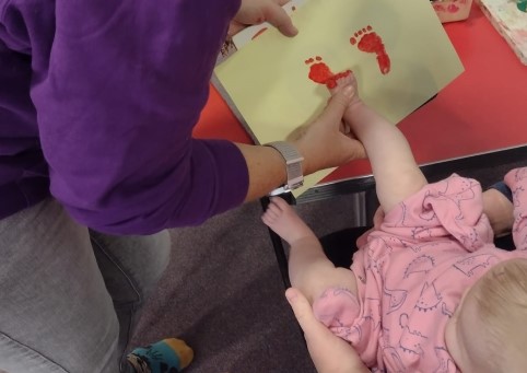 Doing a stamp of a child's feet