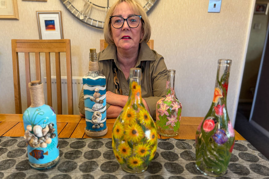 Janice From Weston With Decorative Glass Bottles